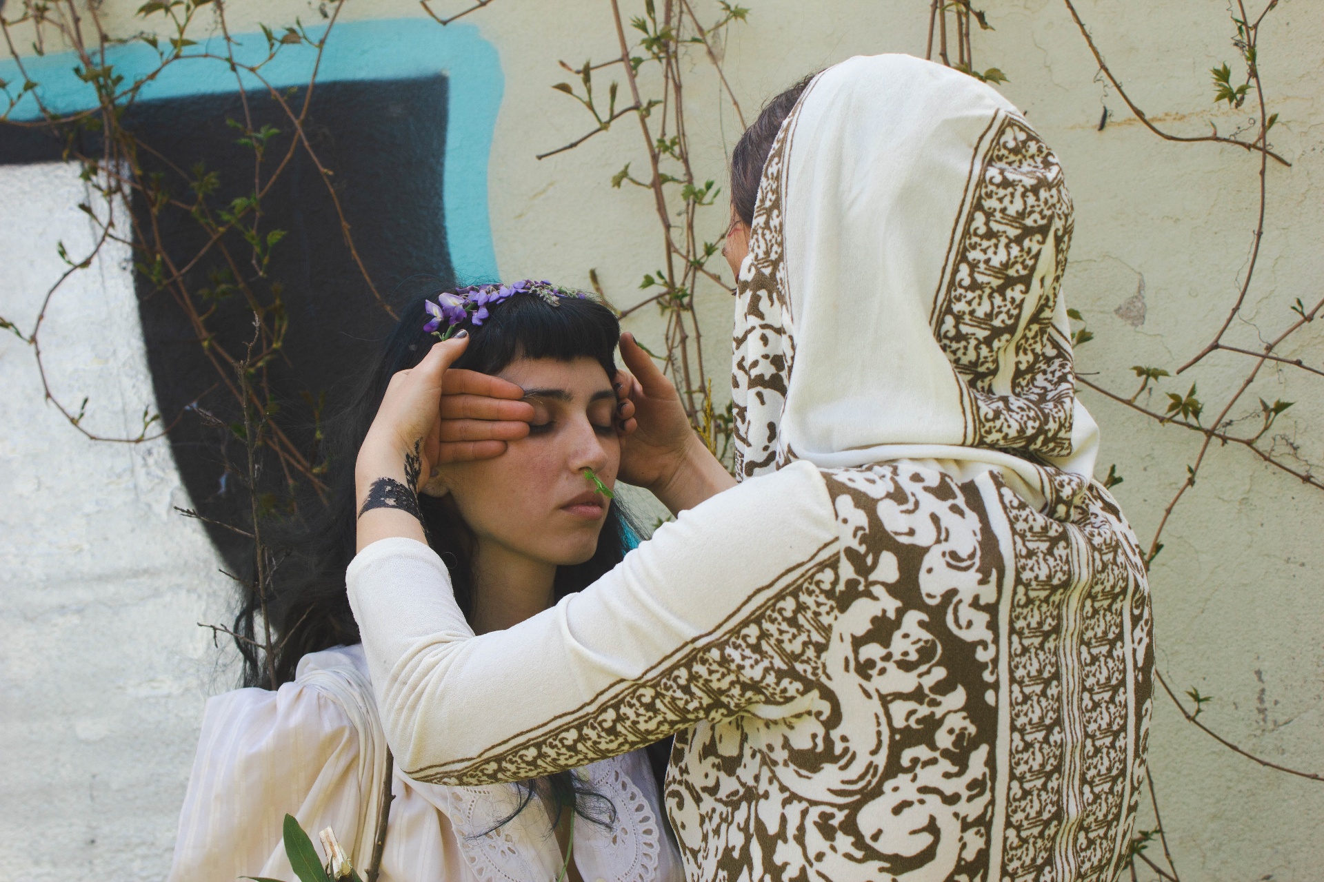 We Were Never Meant to Survive — a performance scene among stone ruins and forest